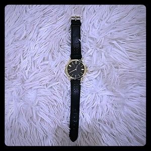 Black and gold watch